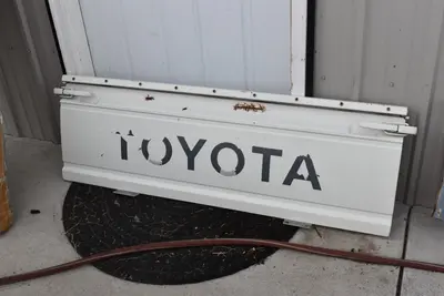 1984-88 Toyota HiLux truck tailgate tail gate w/bed rail + 2 latches OEM used