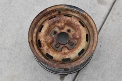Datsun 280Z 14x5" Topy steel wheel 7/1975 OEM used