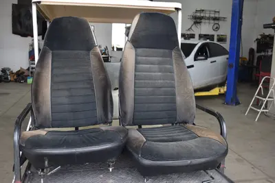 4/71-07/72 Datsun 240Z front seat pair recovered/faded USED w/sliders