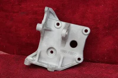 80-82 Datsun 810 A/C compressor bracket OEM used 11910-F5100