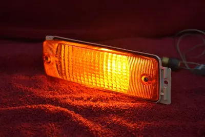 75-78 Datsun 280Z turn signal park lamp light LH driver OEM used *READ