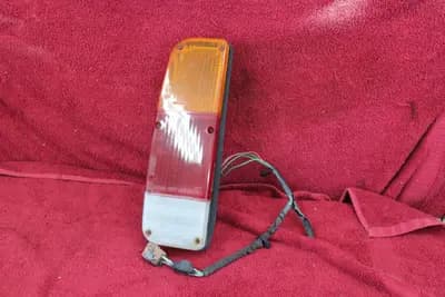 75-78 Toyota truck LH left driver taillight OEM used