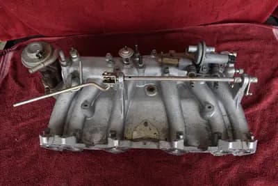 Datsun Nissan 280ZX P72 intake manifold webbed w/EGR OEM used