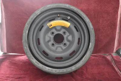 77-78 Datsun 280Z space saver compact spare tire OEM used