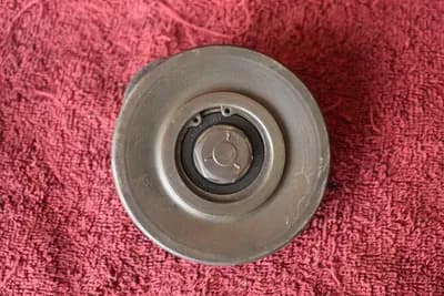 1970-1971.5 Datsun 240Z series 1 A/C compressor tensioner pulley OEM used