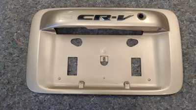 OEM 1997-2001 Honda CRV CR-V Rear License Plate Garnish Trim Gold Tailgate A2